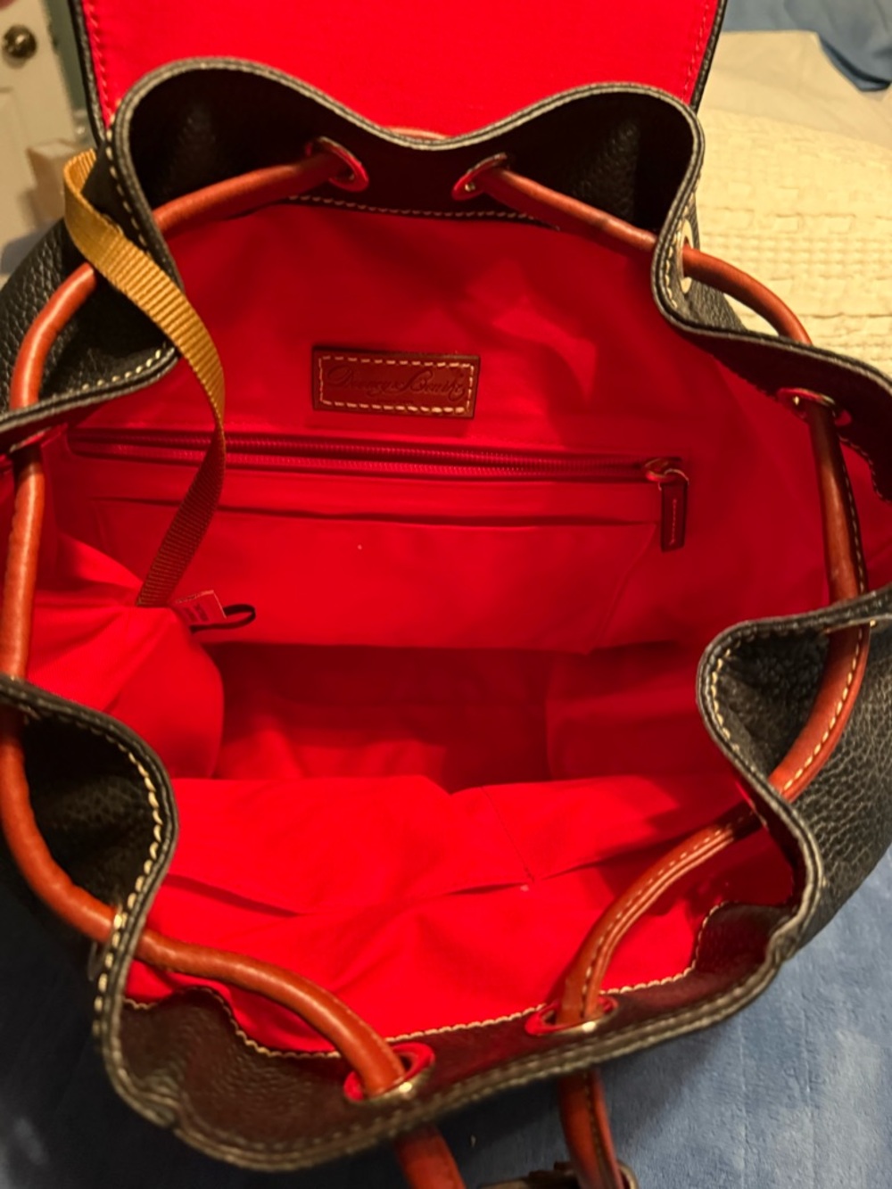 Dooney & Bourke Black Pebbled Leather Drawstring Backpack with Brown Trim - Picture 2 of 6